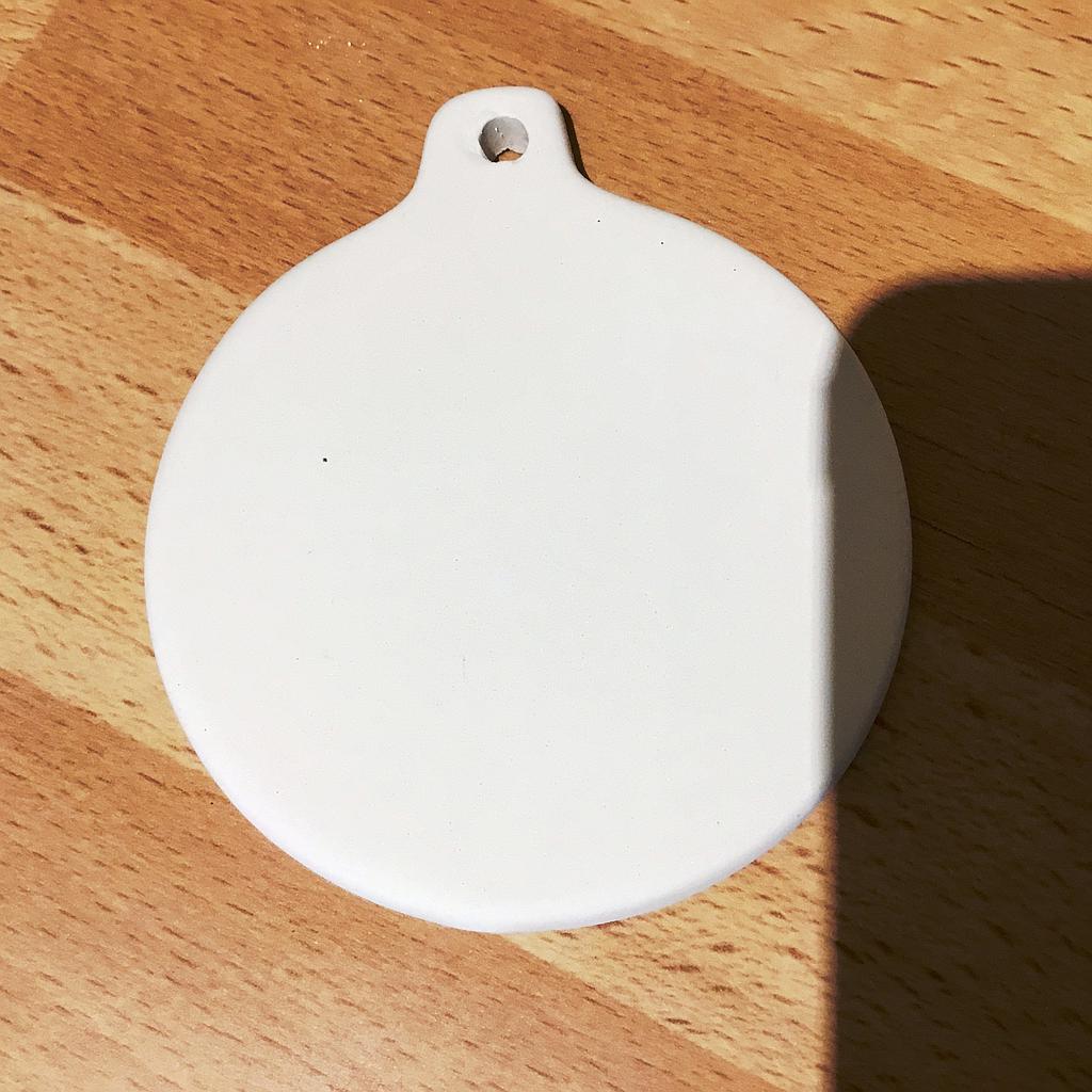 Flat round bauble shape
